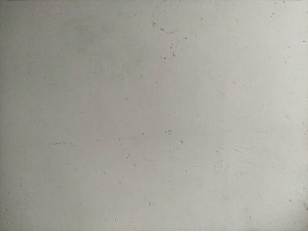 istock Concrete white wall with cracks, scratches, scuffs, horizontal orientation, textured 1679963073