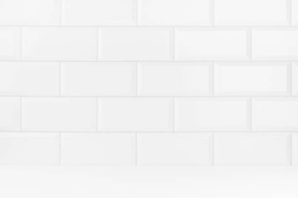istock Elegant white abstract stage with white glossy ceramic rectangle tile wall, mockup abstract interior of bathroom, kitchen or scene for presentation, show, design in classic mediterranean style. 1679972052
