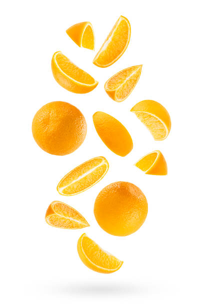 istock Bright oranges as flow fly or fall as art composition. Whole, half, quarter pieces fruit isolated on white background with shadow. Tropical fruits for advertising, design, label product, poster, card. 1679974663