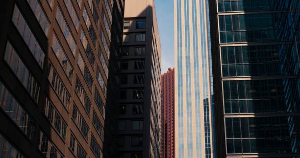 istock Establishing Shot of Skyscraper Buildings. Architecture in Modern Metropolis. Symbolizing Global Business Wealth Growth and Trade. View of skyscraper buildings. Skyscraper windows in downtown New York 1679998180