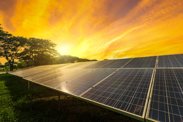 istock Photovoltaic modules solar power plant on dramatic sunset sky background,clean Alternative power energy concept. 1680012435