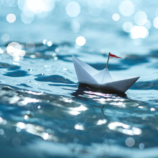 istock Paper Boat by the  Sea 1680094725