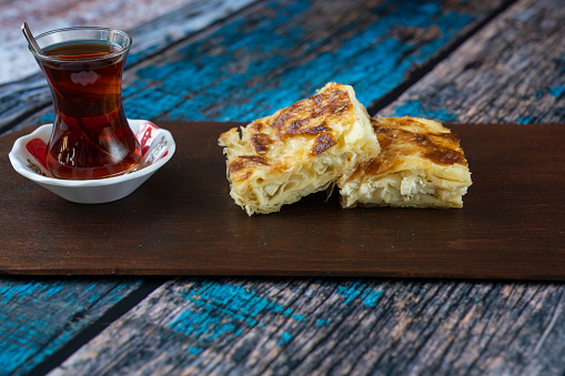 Pastries of Turkish Cuisine,  Accompanied by Turkish Tea Turkish Ring Pastry (Tepsi Boregi), Turkish Kol Boregi and Water Pastry (Su Boregi) Photo, Üsküdar Istanbul, Turkey (Türkiye)