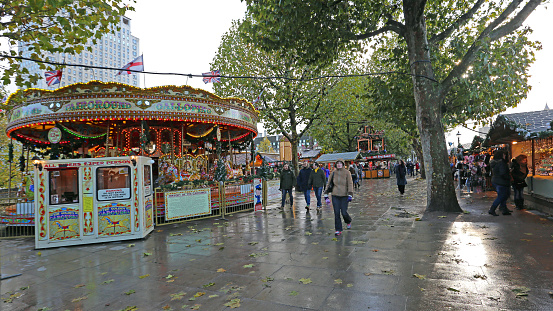 London, United Kingdom - November 20, 2013: Carousel Ride at Christmas Fair Southbank Winter Market in Capital City.