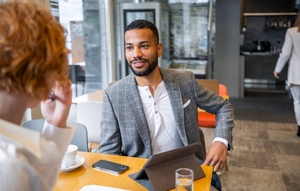 istock Business people meeting in a cafeteria 1680176171