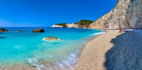 Porto Katsiki beach in Lefkada island, Greece. Beautiful view over the beach with  turquoise water and  tourists