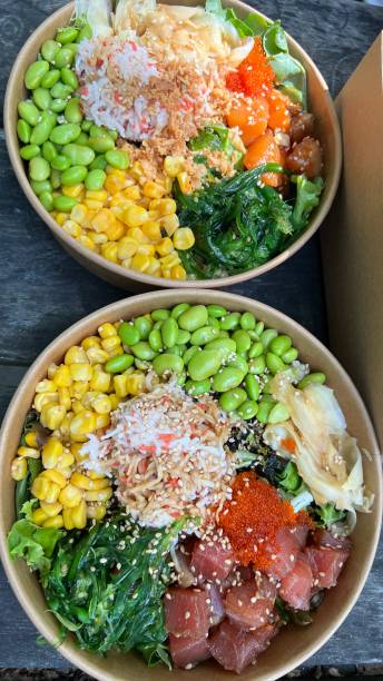 istock Two Hawaiian poke bowls with spicy mayo sauce. 1680221661