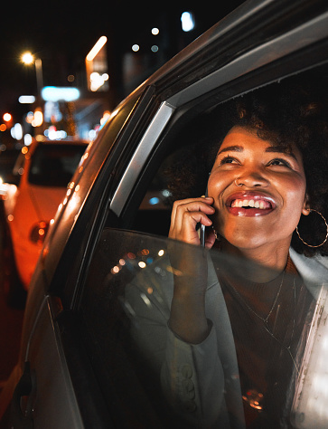 Black woman, phone call and travel at night in city taxi for communication, conversation or networking. Happy African female person smile, talking or late evening on mobile smartphone in discussion