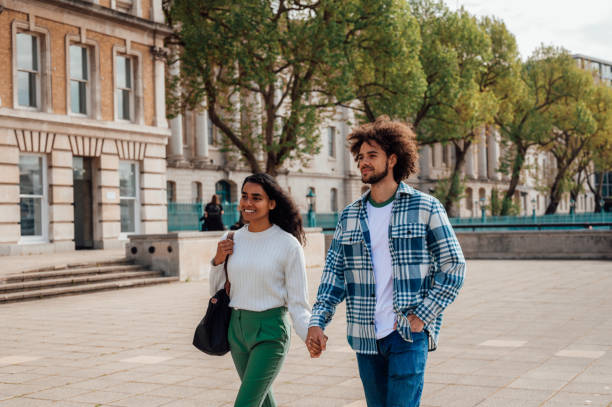 istock A married couple walk hand in hand along a riverside 1680241730