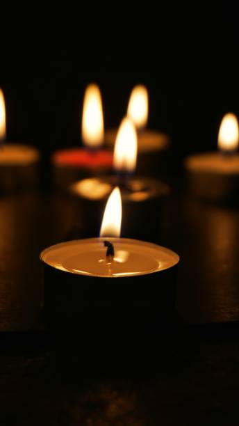 istock Light a candle in the dark. Candle light 1680248667