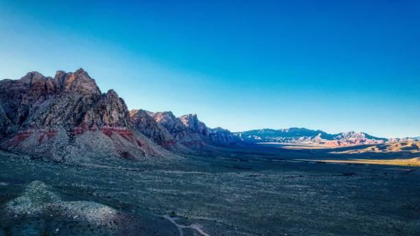 istock Majestic mountain peaks and a brilliant blue sky above 1680281015