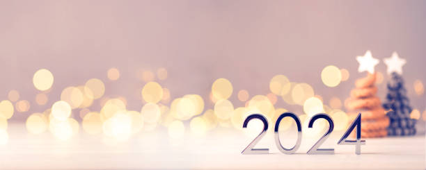 istock Metal numbers 2024 on table with bokeh lights. 1680282062