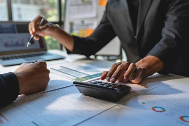 istock Financial analyst analysis business financial report on digital tablet during discussion at meeting of corporate showing the results of their successful teamwork., business meeting concept, Marketing 1680292928