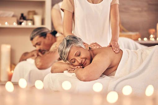 Luxury, massage and zen with old couple in spa for vacation, relax and beauty salon. Peace, wellness and holiday with senior woman and man in hotel villa for retirement, oil treatment and body care