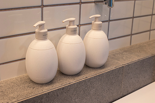 Shampoo bottle with tile background Bathroom