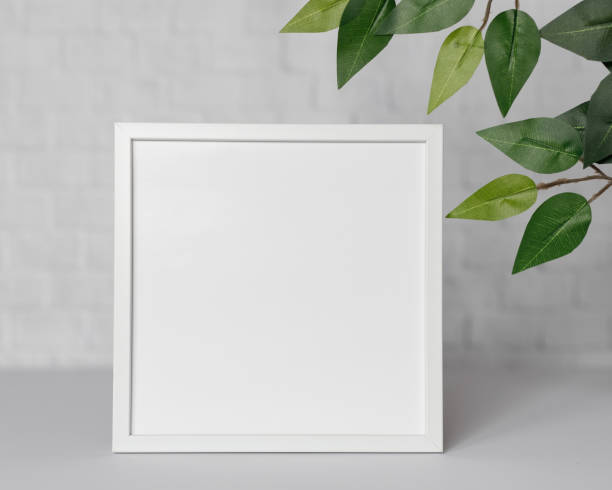 istock Minimal wooden picture poster frame mockup on white wallpaper 1680369802