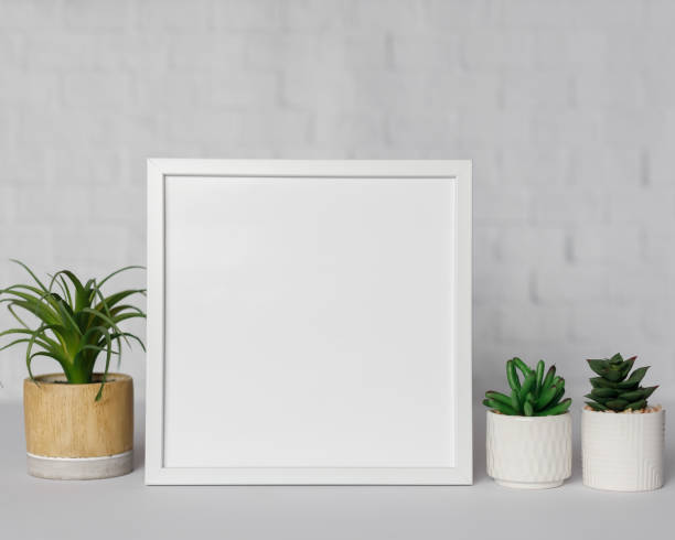 istock Minimal wooden picture poster frame mockup on white wallpaper 1680370204