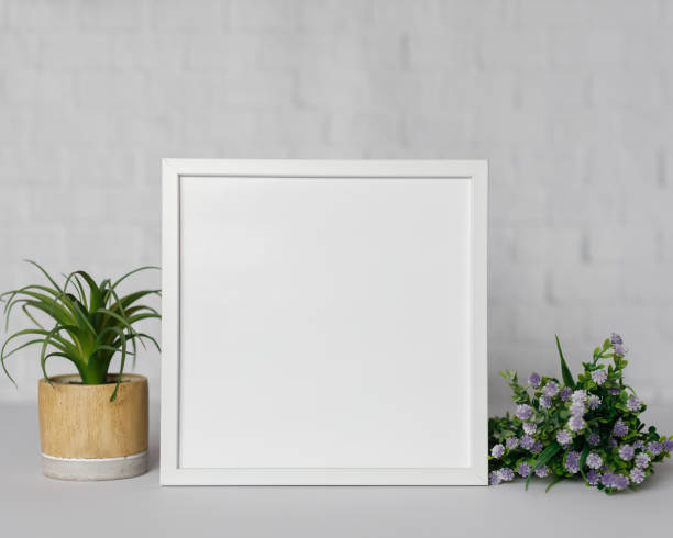 istock Minimal wooden picture poster frame mockup on white wallpaper 1680370362