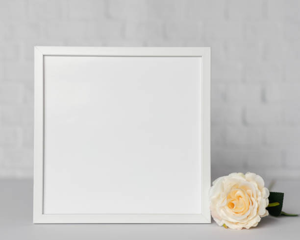 istock Minimal wooden picture poster frame mockup on white wallpaper 1680370367