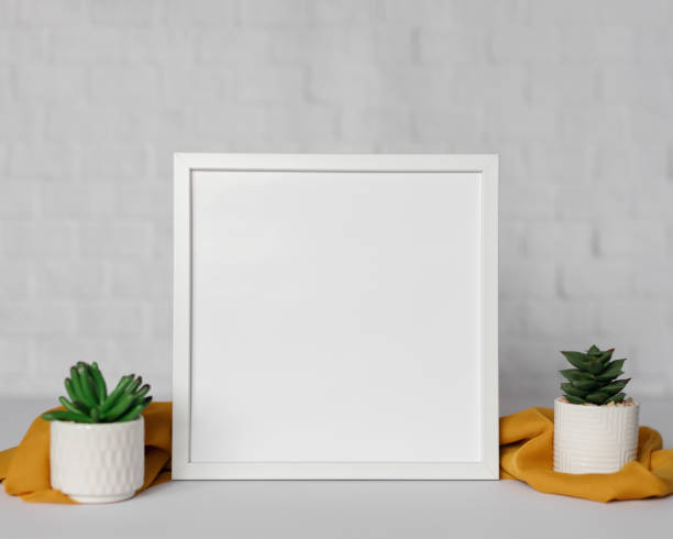 istock Minimal wooden picture poster frame mockup on white wallpaper 1680372267