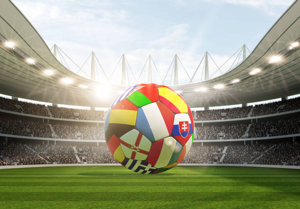 istock Soccer stadium with a colorful ball in the middle 1680403652