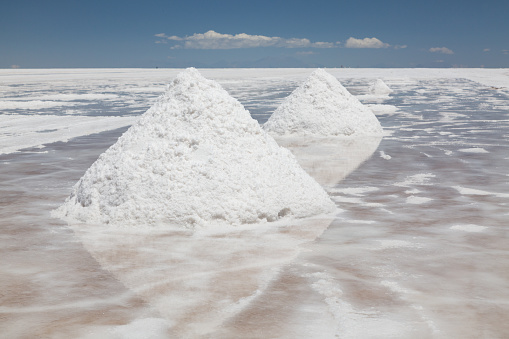 Pile of harvested salt on the  salt flat in Salar de Uyuni