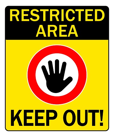 Restricted area, keep out. No entry sign with stop hand gesture inside, on yellow and black background. Texts above and below it.