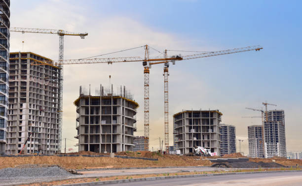 istock Construction site with tower crane. House and buildings construction. 1680436631