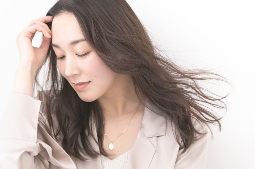 Beauty portrait of Japanese woman, her hair is flowing.