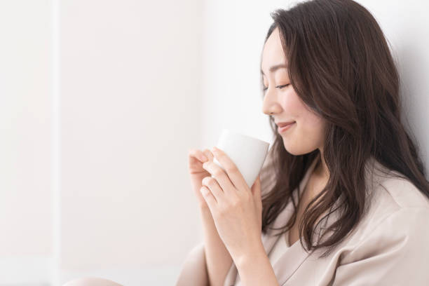 istock A woman is drinking a drink. 1680441599