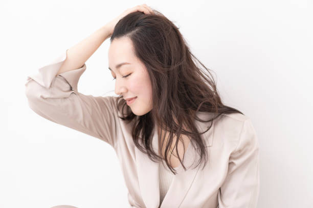 istock A young woman combing her hair. 1680441627