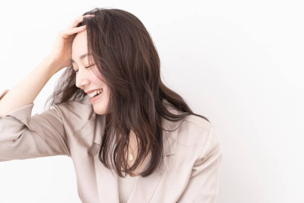 istock A young woman combing her hair. 1680441999