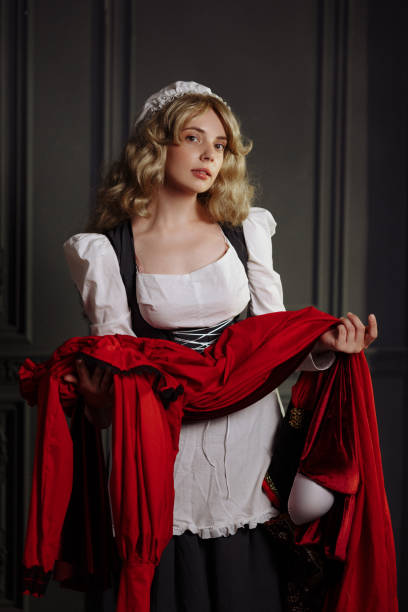 istock Medieval Seamstress with Vintage Dress. 1680482756