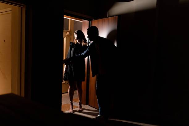 istock Man and woman coming home from a night out 1680482763