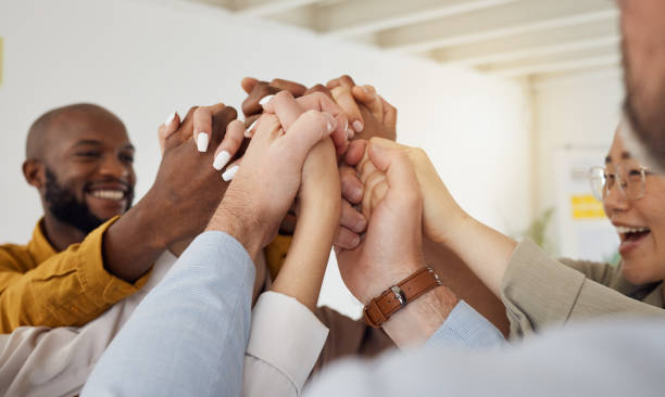 istock Holding hands, business people and happy support with diversity, partnership and collaboration. Celebration, motivation and company staff with solidarity, community and together with teamwork 1680489912