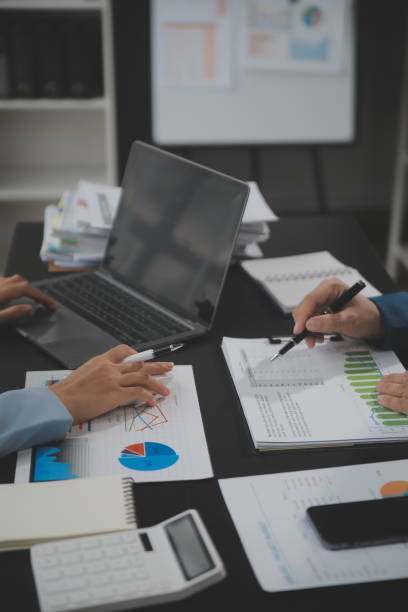 istock Financial Business team present. Business man hands hold documents with financial statistic stock photo, discussion, and analysis report data the charts and graphs. Finance Financial concept 1680512843