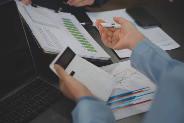istock Financial Business team present. Business man hands hold documents with financial statistic stock photo, discussion, and analysis report data the charts and graphs. Finance Financial concept 1680513971