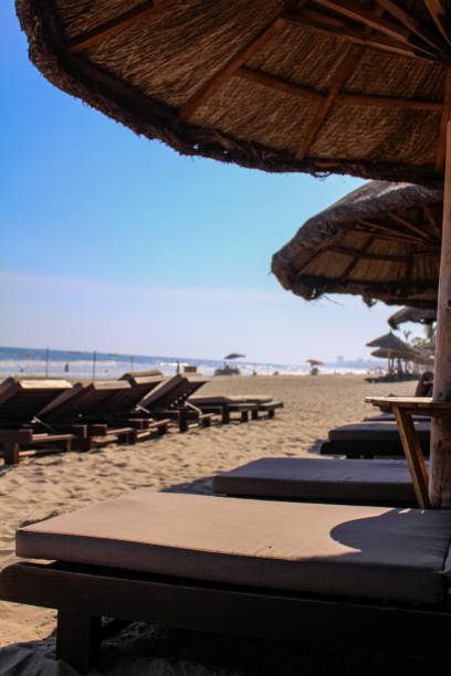istock Beach beds under the beach hut in the beach. 1680519037