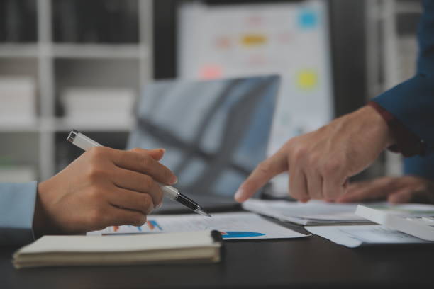 istock Financial Business team present. Business man hands hold documents with financial statistic stock photo, discussion, and analysis report data the charts and graphs. Finance Financial concept 1680536583