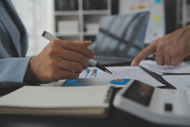 istock Financial Business team present. Business man hands hold documents with financial statistic stock photo, discussion, and analysis report data the charts and graphs. Finance Financial concept 1680536584
