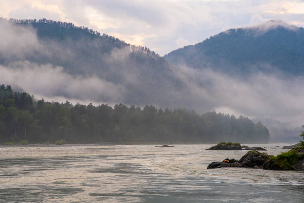 istock A wide, full-flowing mountain river with a fast current. 1680537780