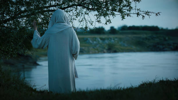 istock Jesus meditate alone by the river Jordan at evening 1680540162
