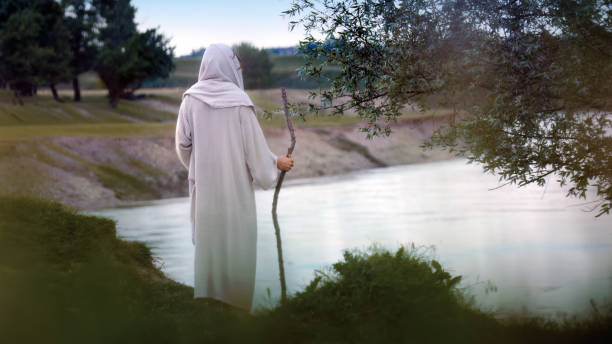 istock Jesus prays alone by the river Jordan 1680540168