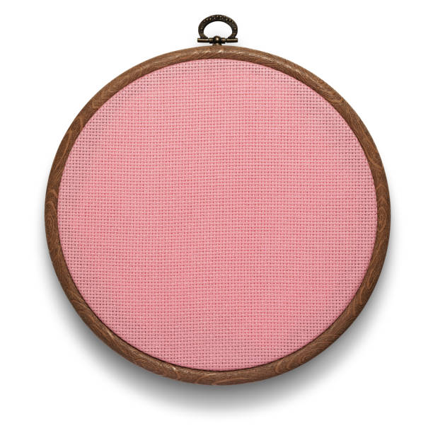 istock Embroidery frame with pink canvas on white background. Accessory for cross-stitch. Save with adding the clipping path 1680543005