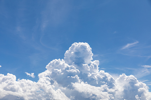 Cumulonimbus,  puffy white clouds in the blue sky