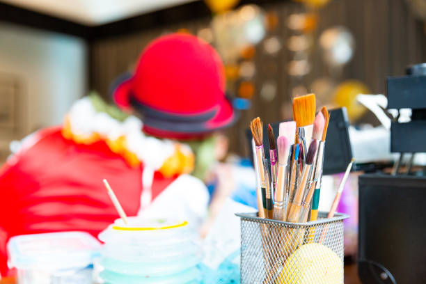Face or body painting focus on paintbrush