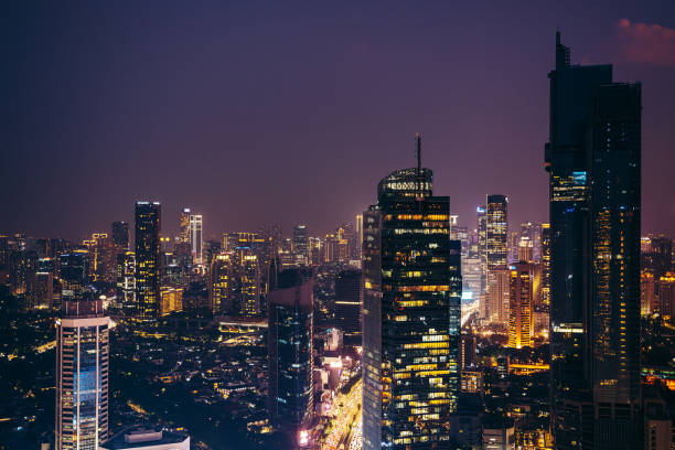 Jakarta business district at dusk, Indonesia Aerial view of a stunning sunset over Jakarta business district in Indonesia capital city.
Jakarta is Southeast Asia largest city and a fast growing. jakarta stock pictures, royalty-free photos & images