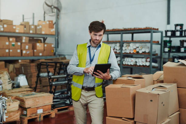 istock Thinking, warehouse or man with boxes, tablet or inspection on checklist, distribution or industry. Person, employee or professional on tech, inventory or stock with package logistics or digital app 1680560054