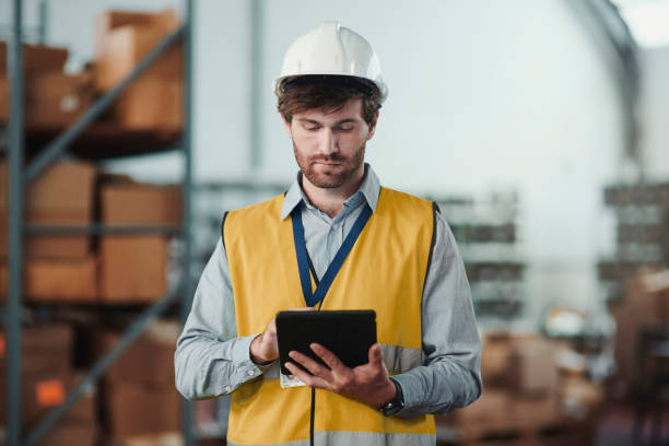 istock Factory, tablet of engineer and serious man check stock, inventory or freight. Technology, worker and person in warehouse in supply chain distribution, logistics and industrial storage for shipping 1680561166
