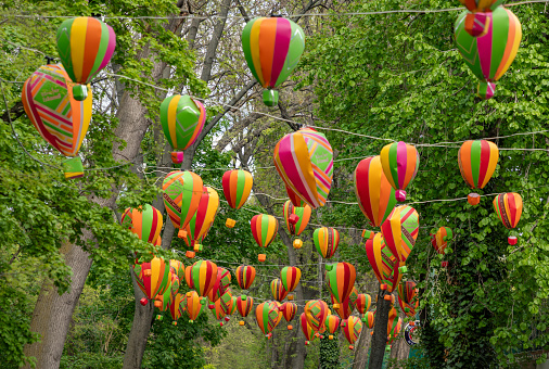 Budapest, Hungary - April 22, 2023: A picture of multiple colorful balloons decorating the Margaret Island.